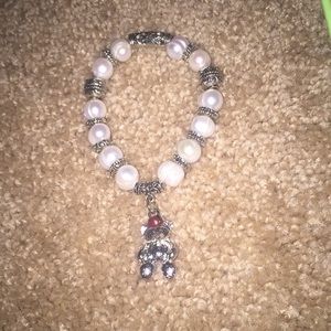 Pearl bracelet with teddy bear charm